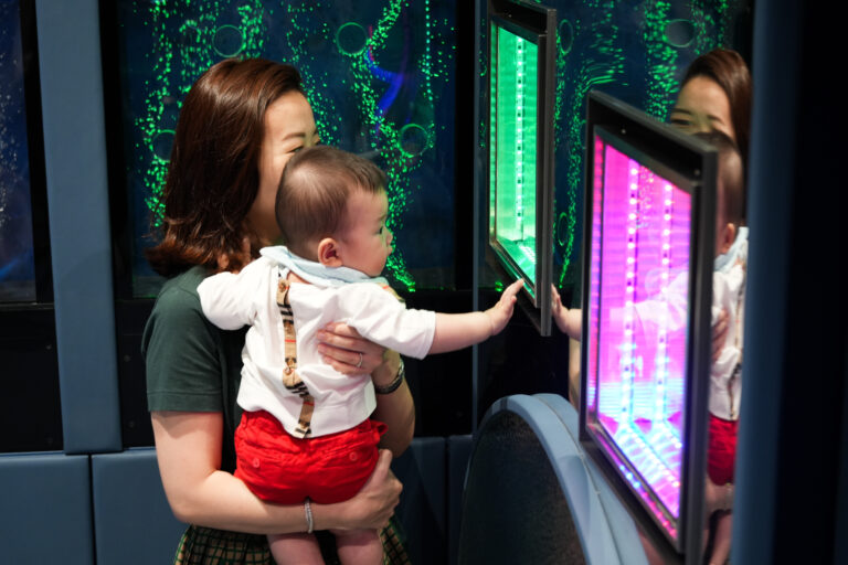 Interactive light and sensory activity for kids at Acorn Playhouse, a leading early learning center in Hong Kong.