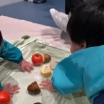 children playing messy play at Acorn Playhouse