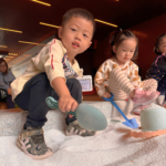Children playing sand at ACorn PLayhouse during camp